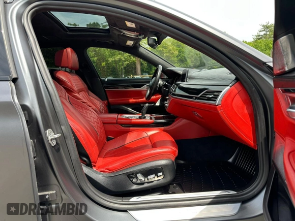 2018 BMW 7 Series M760i xDrive with VIN WBA7H6C54JG614931, listed as a Copart auction lot 59110125 with 71,953 mi miles and Clean title. Bid and sale history available at DreamBid. Image 6.