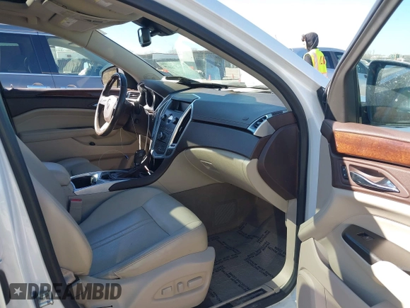2012 Cadillac SRX Luxury Collection with VIN 3GYFNAE37CS597594, listed as a IAAI auction lot 41647807 with 193,836 mi miles and . Bid and sale history available at carsss.com. Image 5.