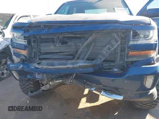 2017 Chevrolet Silverado 1500 LT with VIN 3GCUKREC8HG354004, listed as a IAAI auction lot 41429597 with 77,493 mi miles and . Bid and sale history available at DreamBid. Image 6.
