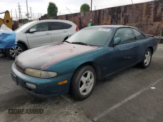 1995 Nissan 240SX z VIN JN1AS44D2SW015735, wystawiony jako Copart lot #59525185 z przebiegiem 165 974 mil mil oraz Czysty tytuł • Clean title. Historia ofert i sprzedaży dostępna na DreamBid. Obrazek 1.