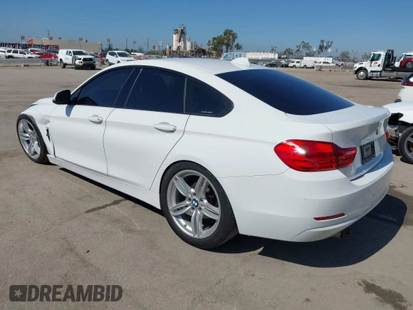 2015 BMW 4 Series 428i with VIN WBA4A9C50FGL85857, listed as a IAAI auction lot 42542619 with 136,411 mi miles and . Bid and sale history available at DreamBid. Image 3.