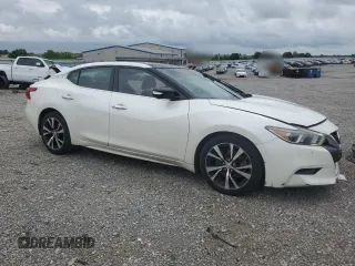 2016 Nissan Maxima Platinum with VIN 1N4AA6AP8GC406798, listed as a Copart auction lot 60143595 with 134,704 mi miles and Salvage title. Bid and sale history available at DreamBid. Image 4.