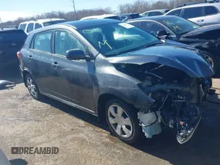 2009 Toyota Matrix with VIN 2T1KU40EX9C084721, listed as a IAAI auction lot 41748177 with 148,374 mi miles. Bid and sale history available at carsss.com. Image 1.