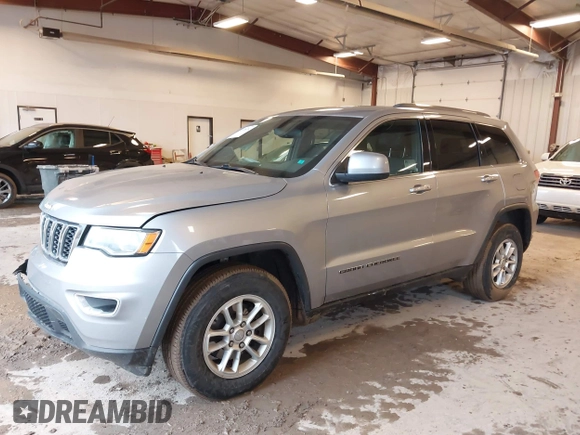 2019 Jeep Grand Cherokee Laredo E with VIN 1C4RJFAG8KC823814, listed as a IAAI auction lot 41728782 with 120,695 mi miles. Bid and sale history available at carsss.com. Image 18.