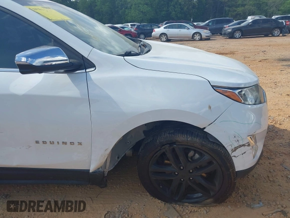 2019 Chevrolet Equinox Premier z VIN 2GNAXPEX9K6177386, wystawiony jako IAAI lot #42172103 z przebiegiem 61 045 mil mil oraz . Historia ofert i sprzedaży dostępna na DreamBid. Obrazek 17.