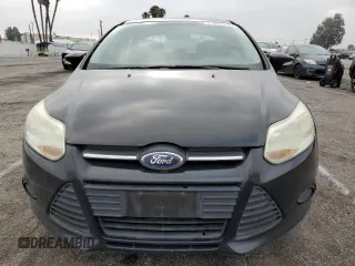 2013 Ford Focus SE z VIN 1FADP3F20DL335132, wystawiony jako Copart lot #61042315 z przebiegiem 149 443 mil mil oraz Czysty tytuł • Clean title. Historia ofert i sprzedaży dostępna na DreamBid. Obrazek 5.