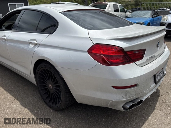 2015 BMW 6 Series 650i xDrive with VIN WBA6B4C57FD899926, listed as a Copart auction lot 54974505 with 63,570 mi miles and Salvage Title. Bid and sale history available at carsss.com. Image 3.