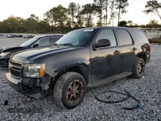 2011 Chevrolet Tahoe Commercial with VIN 1GNLC2E06BR172595, listed as a Copart auction lot 81598064 with 317,477 mi miles and Salvage title. Bid and sale history available at DreamBid. Image 1.
