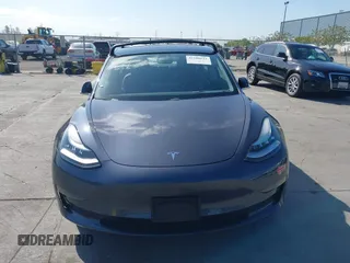 2018 Tesla Model 3 Long Range Battery with VIN 5YJ3E1EA4JF024102, listed as a IAAI auction lot 42100621 with 86,298 mi miles and . Bid and sale history available at DreamBid. Image 11.