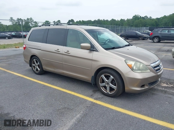 2007 Honda Odyssey Touring z VIN 5FNRL38867B076568, wystawiony jako IAAI lot #42355334 z przebiegiem 211 726 mil mil oraz . Historia ofert i sprzedaży dostępna na DreamBid. Obrazek 1.
