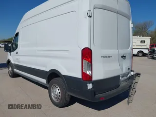 2023 Ford Transit Cargo with VIN 1FTBR2X82PKA33456, listed as a IAAI auction lot 41856428 with 54,088 mi miles and . Bid and sale history available at DreamBid. Image 3.