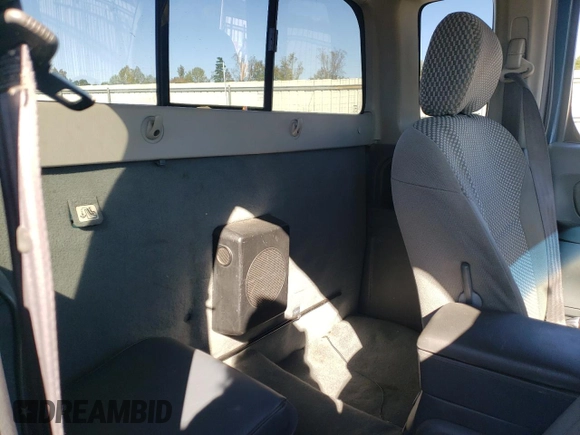 2003 Nissan Frontier XE with VIN 1N6ED26Y93C468148, listed as a Copart auction lot 76468404 with 178,257 mi miles and Salvage title. Bid and sale history available at DreamBid. Image 10.