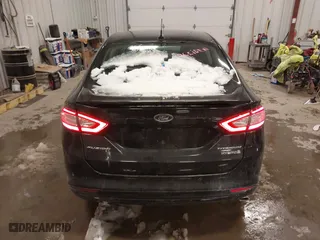 2014 Ford Fusion Titanium Hybrid with VIN 3FA6P0RUXER355654, listed as a IAAI auction lot 41611653 with 211,353 mi miles. Bid and sale history available at carsss.com. Image 16.