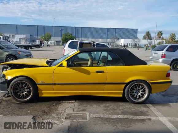 1997 BMW 3-Series 328IC with VIN WBABK8323VET99797, listed as a IAAI auction lot 41616423 with 177,621 mi miles. Bid and sale history available at carsss.com. Image 15.
