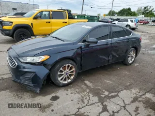 2020 Ford Fusion SE z VIN 3FA6P0HD2LR166835, wystawiony jako Copart lot #64338565 z przebiegiem 138 952 mil mil oraz Czysty tytuł • Clean title. Historia ofert i sprzedaży dostępna na DreamBid. Obrazek 1.