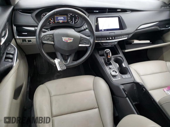 2021 Cadillac XT4 FWD Premium Luxury with VIN 1GYFZCR48MF083164, listed as a Copart auction lot 55377235 with 63,987 mi miles and Salvage title. Bid and sale history available at DreamBid. Image 8.