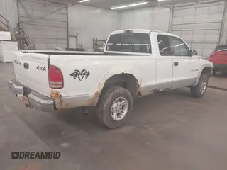1999 Dodge Dakota SLT with VIN 1B7GG22XXXS254782, listed as a IAAI auction lot 41847644 with 164,607 mi miles and . Bid and sale history available at carsss.com. Image 4.