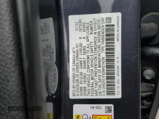 2022 Honda Civic Touring z VIN 2HGFE1F93NH314236, wystawiony jako Copart lot #53380915 z przebiegiem 25 302 mil mil oraz Szkoda całkowita • Salvage title. Historia ofert i sprzedaży dostępna na DreamBid. Obrazek 12.