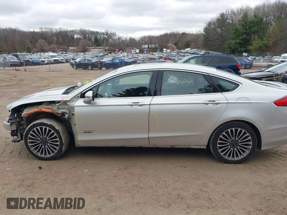 2017 Ford Fusion Titanium with VIN 3FA6P0SU2HR153423, listed as a IAAI auction lot 42029438 with 106,596 mi miles and . Bid and sale history available at DreamBid. Image 14.