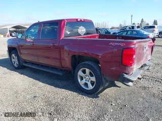 2015 Chevrolet Silverado 1500 LT with VIN 3GCUKREC0FG263001, listed as a IAAI auction lot 41735790 with 266,727 mi miles. Bid and sale history available at carsss.com. Image 3.