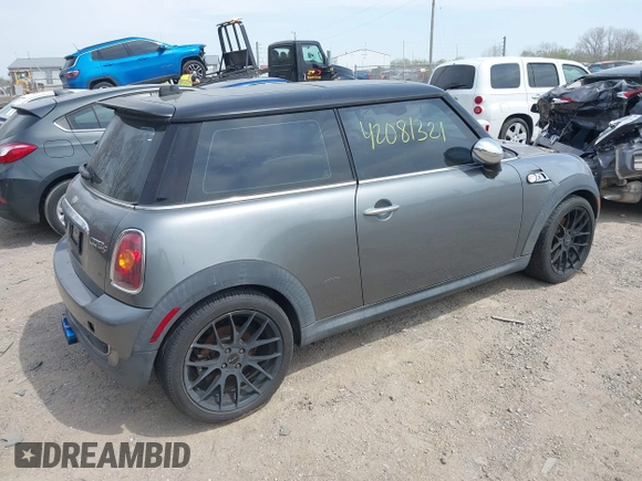 2007 MINI Hardtop S with VIN WMWMF73567TT82315, listed as a IAAI auction lot 42081321 with 123,072 mi miles and . Bid and sale history available at DreamBid. Image 4.