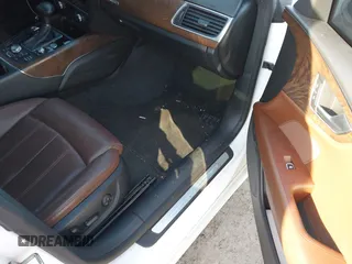 2013 Audi A7 3.0 Prestige with VIN WAU3GAFC6DN063674, listed as a IAAI auction lot 41801556 with 135,913 mi miles. Bid and sale history available at carsss.com. Image 5.