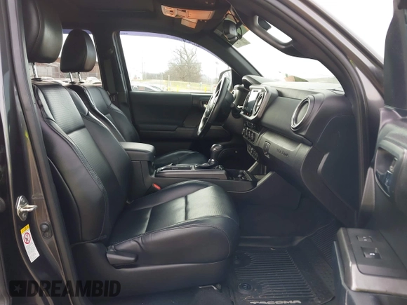 2018 Toyota Tacoma SR with VIN 3TMCZ5AN0JM150540, listed as a IAAI auction lot 41683174 with 78,553 mi miles and . Bid and sale history available at DreamBid. Image 5.