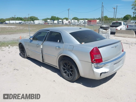 2007 Chrysler 300 C with VIN 2C3KA63H17H849672, listed as a IAAI auction lot 41800769 with 249,457 mi miles and . Bid and sale history available at carsss.com. Image 3.