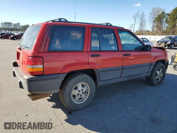 1994 Jeep Grand Cherokee Laredo with VIN 1J4GZ58S8RC254097, listed as a Copart auction lot 47379645 with 240,739 mi miles and Salvage Title. Bid and sale history available at carsss.com. Image 3.