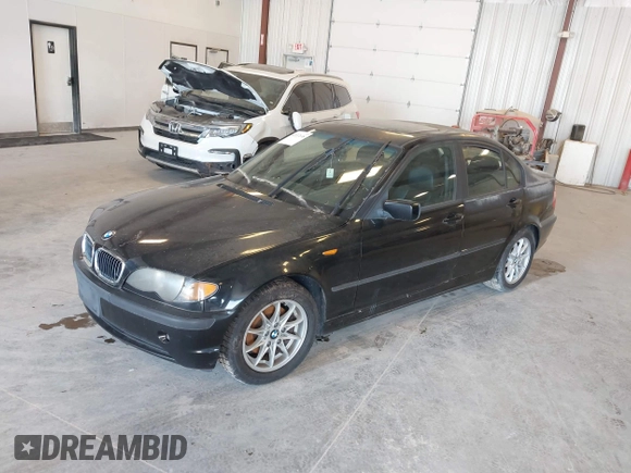 2004 BMW 3 Series 325i with VIN WBAEV334X4KL63050, listed as a IAAI auction lot 42117698 with 173,687 mi miles. Bid and sale history available at carsss.com. Image 2.