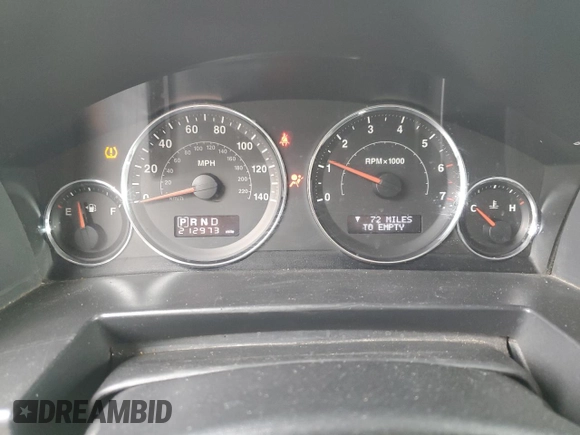 2010 Jeep Commander Sport with VIN 1J4RG4GK5AC119433, listed as a Copart auction lot 87657265 with 212,973 mi miles and Salvage title. Bid and sale history available at DreamBid. Image 9.