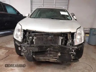 2015 Cadillac SRX Premium Collection with VIN 3GYFNDE32FS623153, listed as a IAAI auction lot 41577809 with 149,932 mi miles. Bid and sale history available at carsss.com. Image 13.