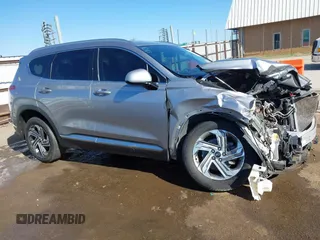 2021 Hyundai Santa Fe SEL z VIN 5NMS24AJ1MH356058, wystawiony jako IAAI lot #41800474 z przebiegiem 82 438 mil mil oraz . Historia ofert i sprzedaży dostępna na DreamBid. Obrazek 14.