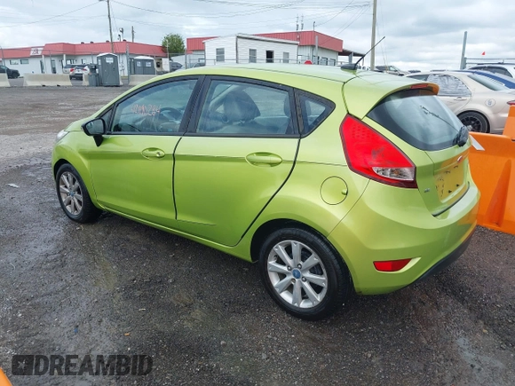 2013 Ford Fiesta SE with VIN 3FADP4EJ7DM136723, listed as a IAAI auction lot 42090284 with 168,004 mi miles and . Bid and sale history available at DreamBid. Image 3.