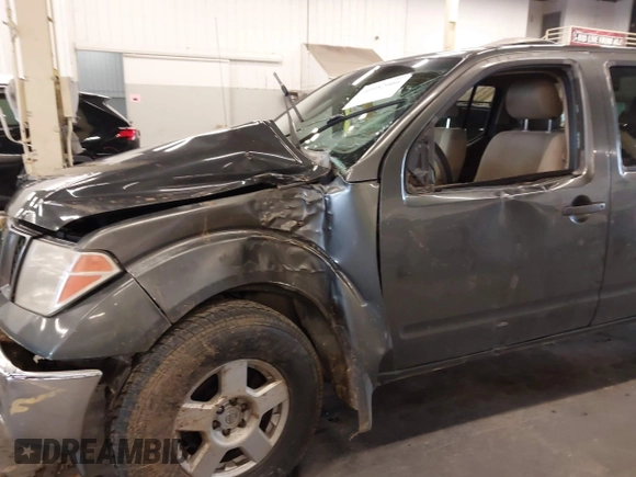 2005 Nissan Frontier LE with VIN 1N6AD07W95C451921, listed as a IAAI auction lot 40952064 with 234,900 mi miles and . Bid and sale history available at DreamBid. Image 6.
