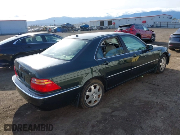 2002 Acura RL with VIN JH4KA96502C010671, listed as a IAAI auction lot 41998263 with 248,336 mi miles. Bid and sale history available at carsss.com. Image 4.