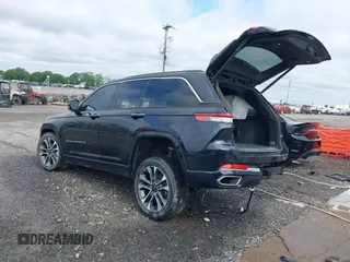 2023 Jeep Grand Cherokee Overland with VIN 1C4RJHDG8P8822650, listed as a IAAI auction lot 42145252 with 63,100 mi miles and . Bid and sale history available at DreamBid. Image 3.