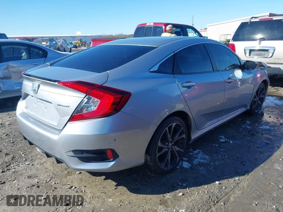 2019 Honda Civic Sport with VIN 2HGFC2F85KH605786, listed as a IAAI auction lot 41621480 with 66,438 mi miles and . Bid and sale history available at DreamBid. Image 4.
