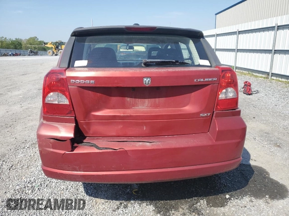 2009 Dodge Caliber SXT with VIN 1B3HB48A29D144304, listed as a Copart auction lot 53119375 with 173,778 mi miles and Salvage Title. Bid and sale history available at DreamBid. Image 6.
