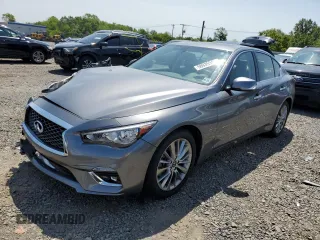 2019 Infiniti Q50 Luxe с VIN JN1EV7AR0KM590406, выставлен на аукционе Copart как лот 58935345 с пробегом 5 103 миль миль и Списание • Salvage title. История ставок и продаж доступна на DreamBid. Изображение 1.