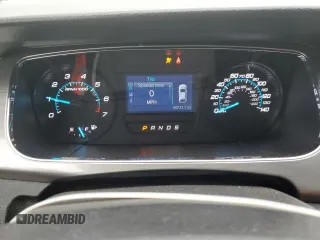 2016 Ford Taurus SEL z VIN 1FAHP2E87GG146931, wystawiony jako Copart lot #56135655 z przebiegiem 99 733 mil mil oraz Szkoda całkowita • Salvage title. Historia ofert i sprzedaży dostępna na DreamBid. Obrazek 9.