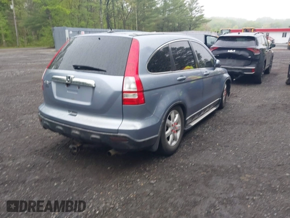 2009 Honda CR-V EX-L z VIN JHLRE487X9C020692, wystawiony jako IAAI lot #42190429 z przebiegiem 173 735 mil mil oraz . Historia ofert i sprzedaży dostępna na DreamBid. Obrazek 4.