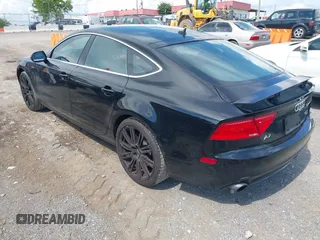2012 Audi A7 Premium Plus with VIN WAUYGAFC0CN087604, listed as a IAAI auction lot 42747927 with 155,662 mi miles and . Bid and sale history available at DreamBid. Image 3.
