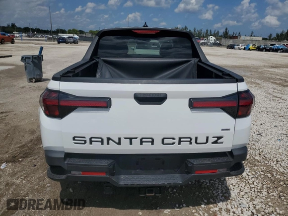 2022 Hyundai Santa Cruz SEL z VIN 5NTJB4AE7NH005711, wystawiony jako Copart lot #50662245 z przebiegiem 32 354 mil mil oraz Nie do naprawy • Non repairable. Historia ofert i sprzedaży dostępna na DreamBid. Obrazek 6.