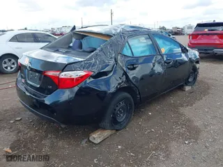 2019 Toyota Corolla L with VIN 5YFBURHE2KP935806, listed as a IAAI auction lot 41673090 with 61,926 mi miles. Bid and sale history available at carsss.com. Image 4.