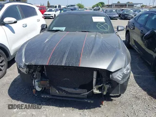 2015 Ford Mustang EcoBoost z VIN 1FA6P8TH4F5420173, wystawiony jako IAAI lot #42236518 z przebiegiem Nie podano mil oraz . Historia ofert i sprzedaży dostępna na DreamBid. Obrazek 12.