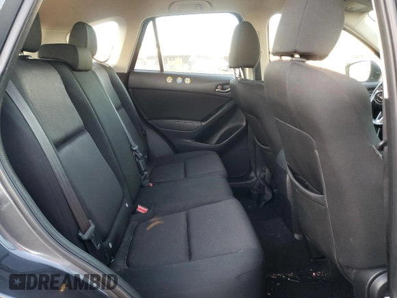 2016 Mazda CX-5 Sport with VIN JM3KE2BY9G0771969, listed as a Copart auction lot 80966064 with 99,348 mi miles and Salvage title. Bid and sale history available at DreamBid. Image 12.