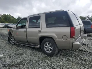 2000 Cadillac Escalade with VIN 1GYEK13R5YR112858, listed as a Copart auction lot 71651294 with 228,689 mi miles and Salvage Title. Bid and sale history available at carsss.com. Image 2.