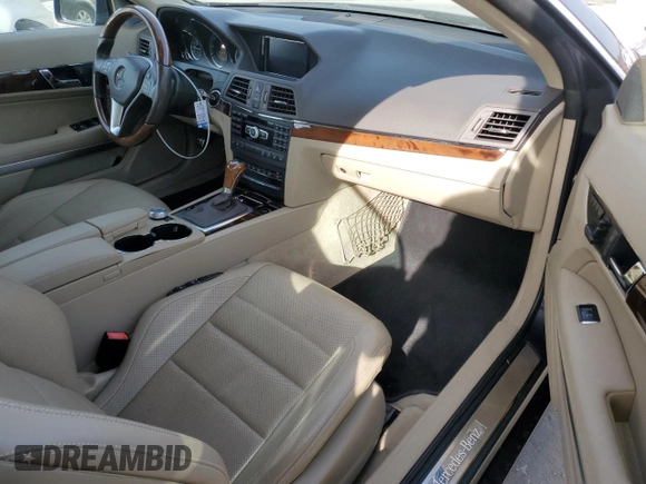 2012 Mercedes-Benz E 350 with VIN WDDKK5KF0CF147749, listed as a Copart auction lot 84523024 with 61,589 mi miles and Salvage Title. Bid and sale history available at DreamBid. Image 8.