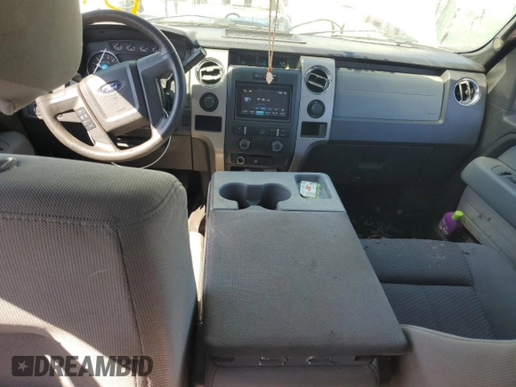 2012 Ford F-150 XL with VIN 1FTFW1EF5CFB56290, listed as a Copart auction lot 74875874 with 233,978 mi miles and Salvage title. Bid and sale history available at DreamBid. Image 8.